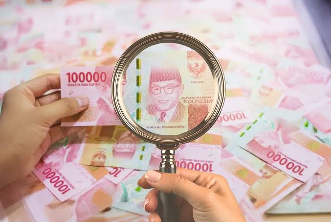 Waspada Uang Palsu! Pilih Penukaran Mata Uang Asing yang Legal dan Terjamin seperti Dolarindo Money Changer